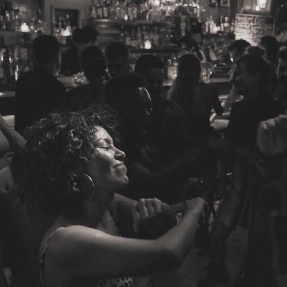 a group of people standing in front of a crowd